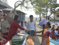 distributing-saree-