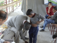 tailor-taking-measurement-